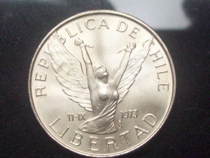 Liberty is shown breaking the chains of tyranny in this Chilean 10 Pesos coin.